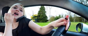 Distracted Driver about to cause car crash